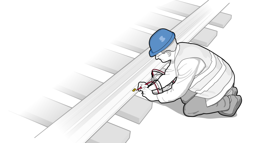 Druckmessgerät an Bahngleis Infografik